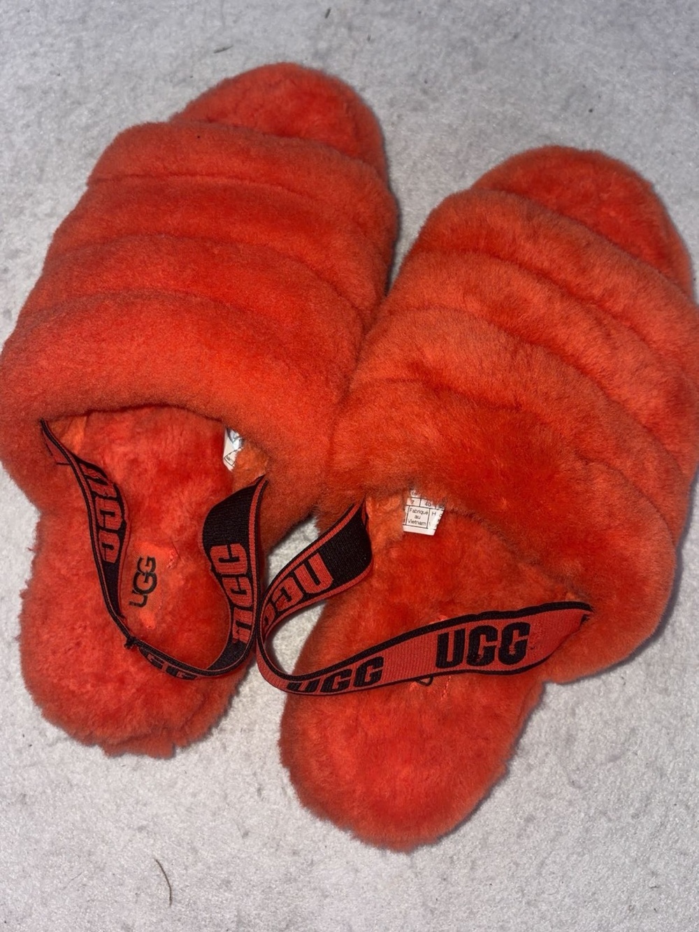 UGG Kids Bright Orange Fuzzy Slide Slippers with Branded Strap